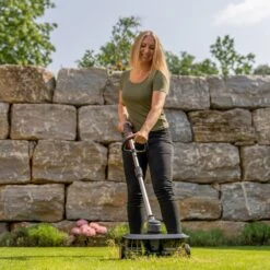 AL-KO AR 1835 18V Bosch Home & Garden Compatible Cordless Lawn Raker (Tool Only) (Bundle Builder) 12 AL-KO AR 1835 18V Bosch Home & Garden Compatible Cordless Lawn Raker (Tool Only) (Bundle Builder) -Greenworks Sale Shop al ko ar1835 lawn raker lifestyle in use 2