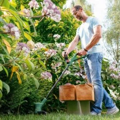 Bosch EasyGrassCut 18-230G 23cm 18V Cordless Grass Trimmer / Lawn Edger (with 2Ah Battery & Charger) (Bundle Builder) -Greenworks Sale Shop bosch boegc18 230g strimmer lifestyle 3 1