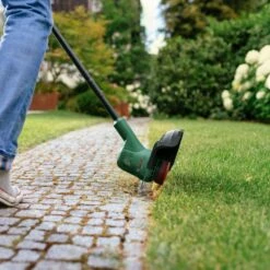 Bosch EasyGrassCut 18-230G 23cm 18V Cordless Grass Trimmer / Lawn Edger (with 2Ah Battery & Charger) (Bundle Builder) -Greenworks Sale Shop bosch boegc18 230g strimmer lifestyle 4 1