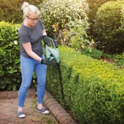 Bosch EasyHedgeCut 18-45 45cm 18V Cordless Hedge Trimmer (with 2.0Ah Battery & Charger) (Bundle Builder) 15 Bosch EasyHedgeCut 18-45 45cm 18V Cordless Hedge Trimmer (with 2.0Ah Battery & Charger) (Bundle Builder) -Greenworks Sale Shop bosch easyhedgecut 18 45 lifestyle 6 2