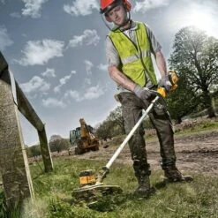 DeWalt DCM561P1S-GB 18V XR Cordless Grass Trimmer (with 5Ah Battery & Charger) -Greenworks Sale Shop dewalt dcm561p1s grass trimmer lifestyle