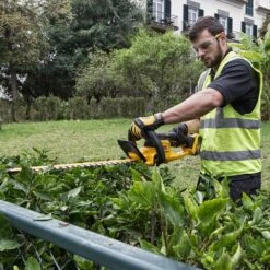 DeWalt DCM563PB-XJ 18V XR Cordless Hedge Trimmer (Tool Only) -Greenworks Sale Shop dewalt dcm563 hedge trimmer lifestyle 2 2