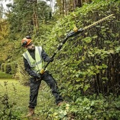 DeWalt DCMPH566N-XJ 18V XR Cordless Pole Hedge Trimmer (Tool Only) -Greenworks Sale Shop dewalt dcmph566 pole hedge trimmer lifestyle 2 1