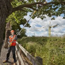 DeWalt DCMPS567P1-GB 18V XR Cordless Pole Saw (with 5Ah Battery & Charger) 17 DeWalt DCMPS567P1-GB 18V XR Cordless Pole Saw (with 5Ah Battery & Charger) -Greenworks Sale Shop dewalt dcmpp567 pole pruner lifestyle 2