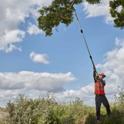 DeWalt DCMPS567N-XJ 18V XR Cordless Pole Saw (Tool Only) -Greenworks Sale Shop dewalt dcmpp567 pole pruner lifestyle 5 1