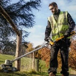 DeWalt DCMST561N-XJ 18V XR Cordless Grass Trimmer (Tool Only) -Greenworks Sale Shop dewalt dcmst561 grass trimmer lifestyle 4 1