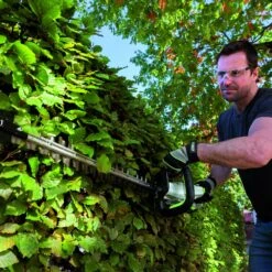 EGO Power+ HT2411E 60cm 56V Cordless Hedge Trimmer (with 2.5Ah Battery & Charger) 19 EGO Power+ HT2411E 60cm 56V Cordless Hedge Trimmer (with 2.5Ah Battery & Charger) -Greenworks Sale Shop ego power plus ht2410e hedge trimmer lifestyle 1