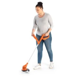 Flymo SimpliTrim Li 14.4V Cordless Grass Trimmer (with 2.0Ah Battery & Charger) -Greenworks Sale Shop flymo fst14.4li grass trimmer in use