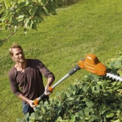Flymo SabreCut XT Electric Long Reach Hedge Trimmer -Greenworks Sale Shop flymo sabrecut xt electric pole hedge trimmer lifestyle 2