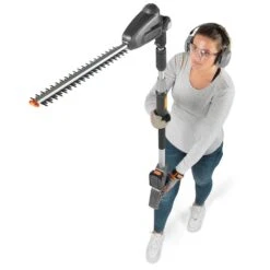 Flymo UltraReach 420 18V Cordless Pole Hedge Trimmer (with 2.5Ah Battery & Charger) (Bundle Builder) -Greenworks Sale Shop flymo ultrareach 420 pole hedge trimmer rotating head in use 1