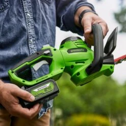 GreenWorks G24HT56IIK2 24V Cordless Hedge Trimmer (with 2Ah Battery & Charger) 13 GreenWorks G24HT56IIK2 24V Cordless Hedge Trimmer (with 2Ah Battery & Charger) -Greenworks Sale Shop greenworks g24ht56ii lifestyle 3 1