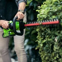 GreenWorks G40HT61K2 G-MAX 40V Cordless Hedge Trimmer (with 2Ah Battery & 2A Charger) (Bundle Builder) 16 GreenWorks G40HT61K2 G-MAX 40V Cordless Hedge Trimmer (with 2Ah Battery & 2A Charger) (Bundle Builder) -Greenworks Sale Shop greenworks g40ht61 hedge trimmer lifestyle battery better 1 1