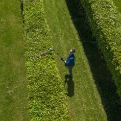 GreenWorks Pro GD60PHT51 60V Cordless Long Reach Hedge Trimmer (Bare Tool) (Bundle Builder) -Greenworks Sale Shop greenworks gd60pht51 pole hedge trimmer aerial 1