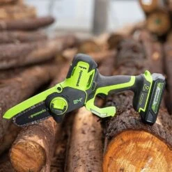 GreenWorks G24MCS10K2 24V Cordless Mini Pruning Chainsaw (with 2Ah Battery & 2A Charger) -Greenworks Sale Shop greenworks mcs10 mini chainsaw lifestyle 1