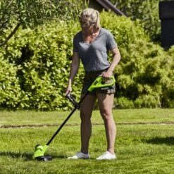 GreenWorks G24LT25K2 25cm 24V Cordless Grass Trimmer (with 2Ah Battery & 0.5A Economy Charger) (Bundle Builder) -Greenworks Sale Shop gwg24lt25 in use 1 1