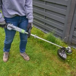 EGO Power+ ST1401E-ST 35cm Split Shaft 56V Cordless Grass Trimmer (with 2.5Ah Battery & Charger) -Greenworks Sale Shop st1400e st lifestyle 1 1