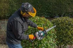 Webb HC600 60cm Petrol Hedge Trimmer -Greenworks Sale Shop webb hc600 hedge trimmer lifestyle side